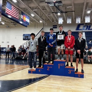 Wrestlers on podium 4